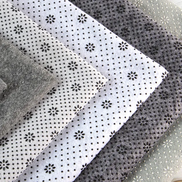 Fabricant de tissu non tissé enduit de points